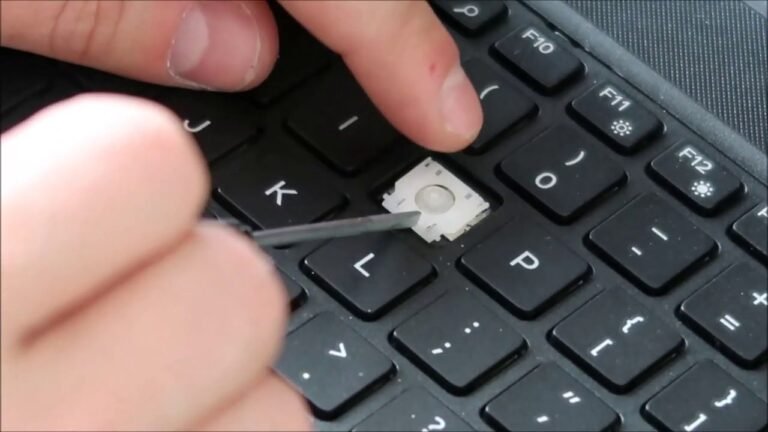 How to Put a Dell Laptop Key Back on